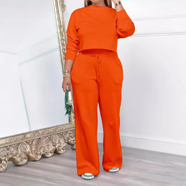 Women's long sleeve pants suit with elastic waist, available in vibrant colors, perfect for commuting or casual outings.