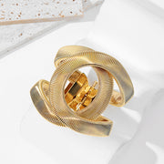 Shine On: The Metallic Cuff Bracelet Trend for Spring - Modiniva LLC