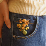 Sunshine in Your Pocket: Sunny Blossom Enamel Badge - Modiniva LLC